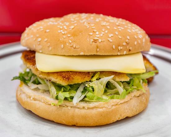 A chicken burger with melted cheese and lettuce on a sesame seed bun